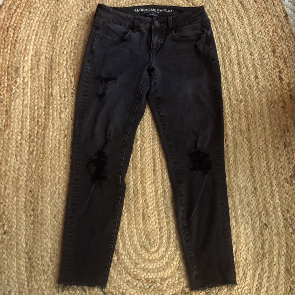 Distressed high-rise stretch skinny jeans in black